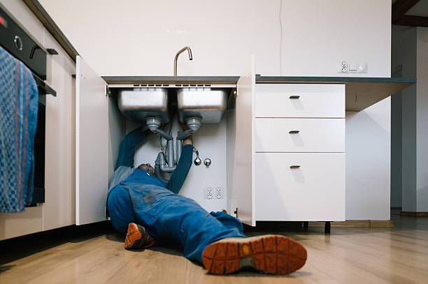Professional Emergency Plumber technician working in Shirley, NY